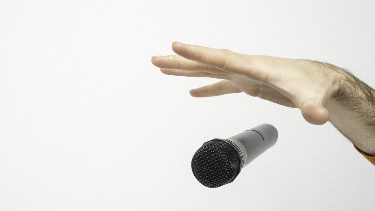 a person drops a microphone